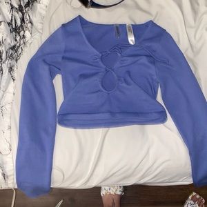 Brand new blue long sleeve crop top w/ a cute part